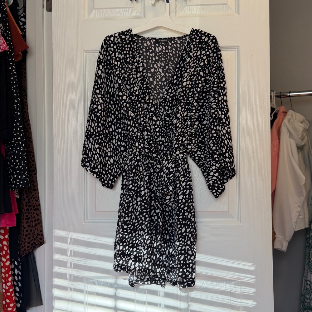 Flattering Black and White Polka Dot Romper with Tie Belt and Pockets!
